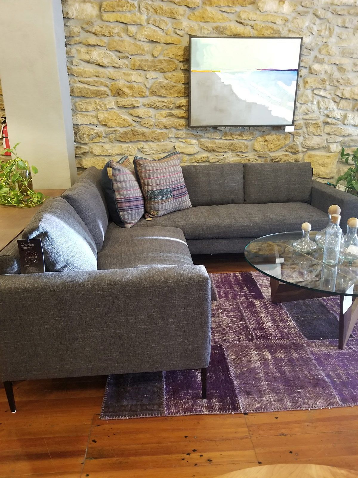 Gorgeous gray modern sectional sofa sold by Eagles' Rest Natural Mattresses and Furniture inLawrence, Kansas.