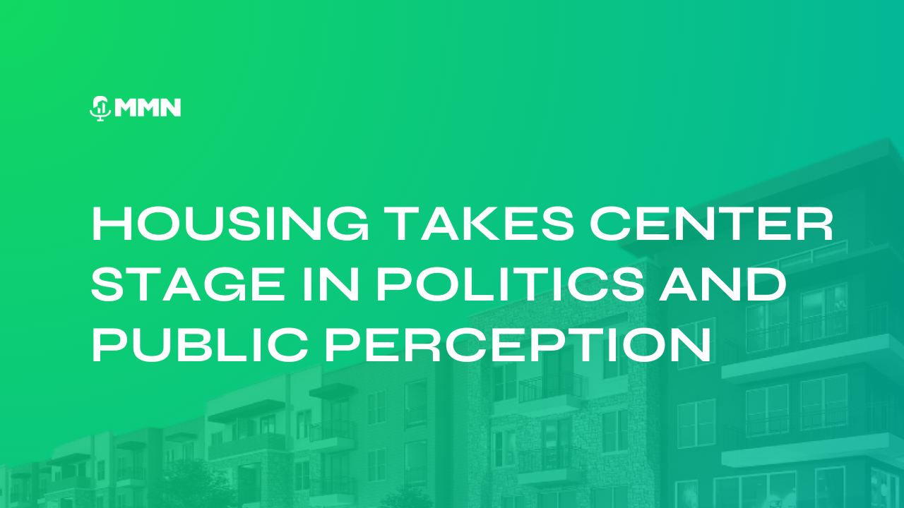 Building with aqua-colored siding against a clear, blue sky.