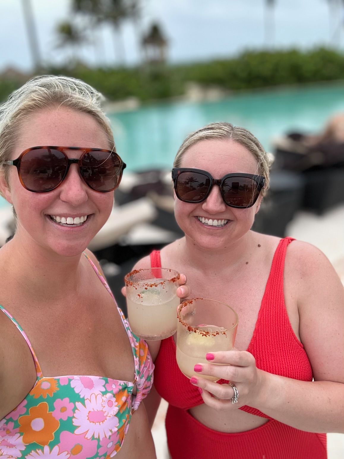best friends smiling with margaritas