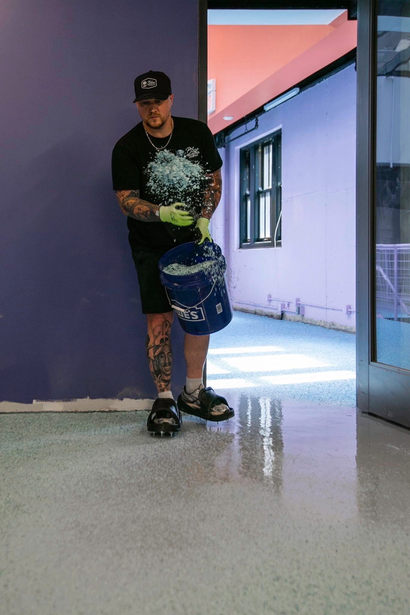 Close-up of a beige speckled aggregate concrete surface.