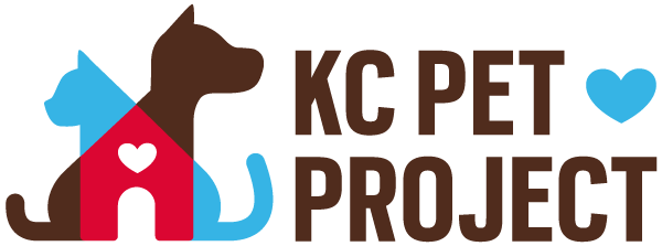 Logo of KC Pet Project: Brown dog, blue cat in a red house with a white heart, brown text, blue heart.