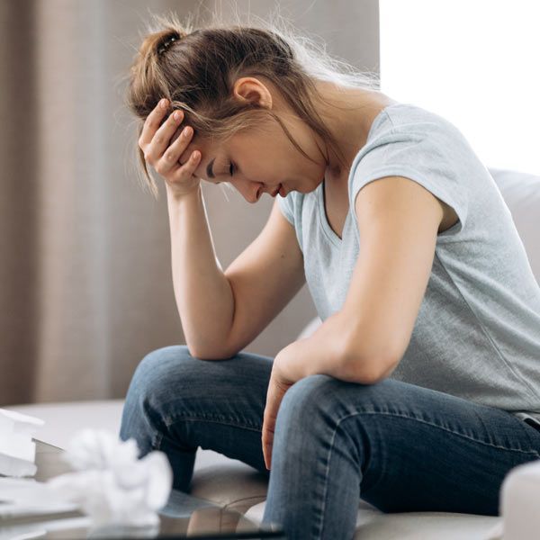 woman with chronic stress at work 