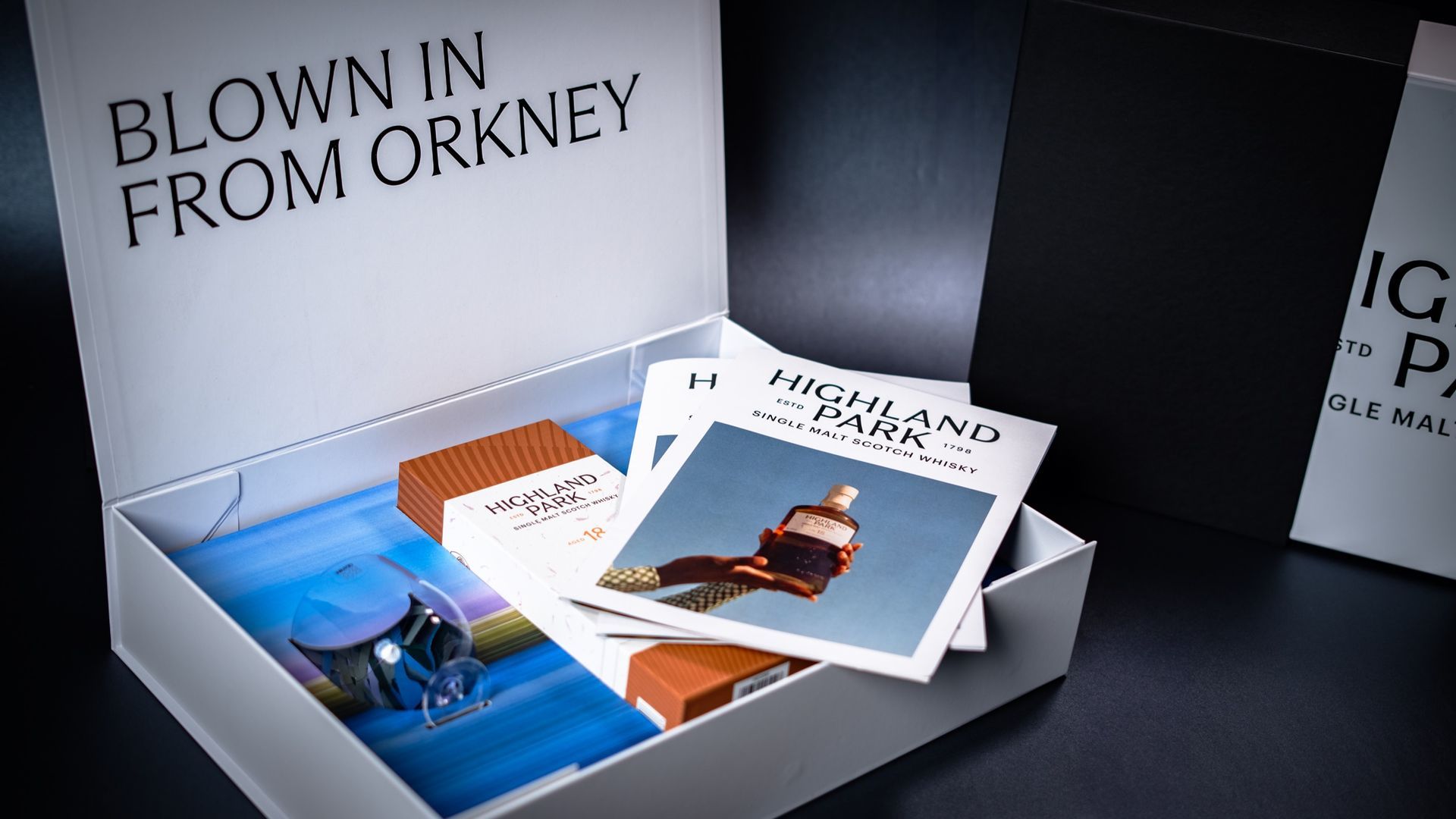 luxury box with brochure and travel magazine in.