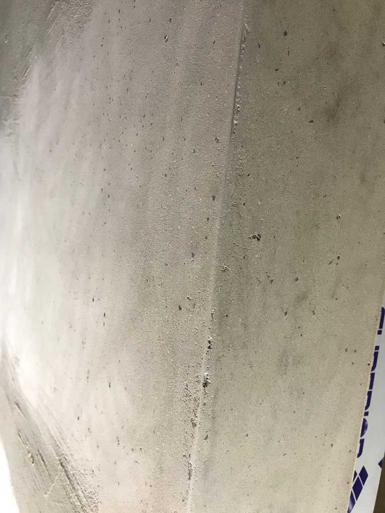 detail of beton stucco plaster grey wall