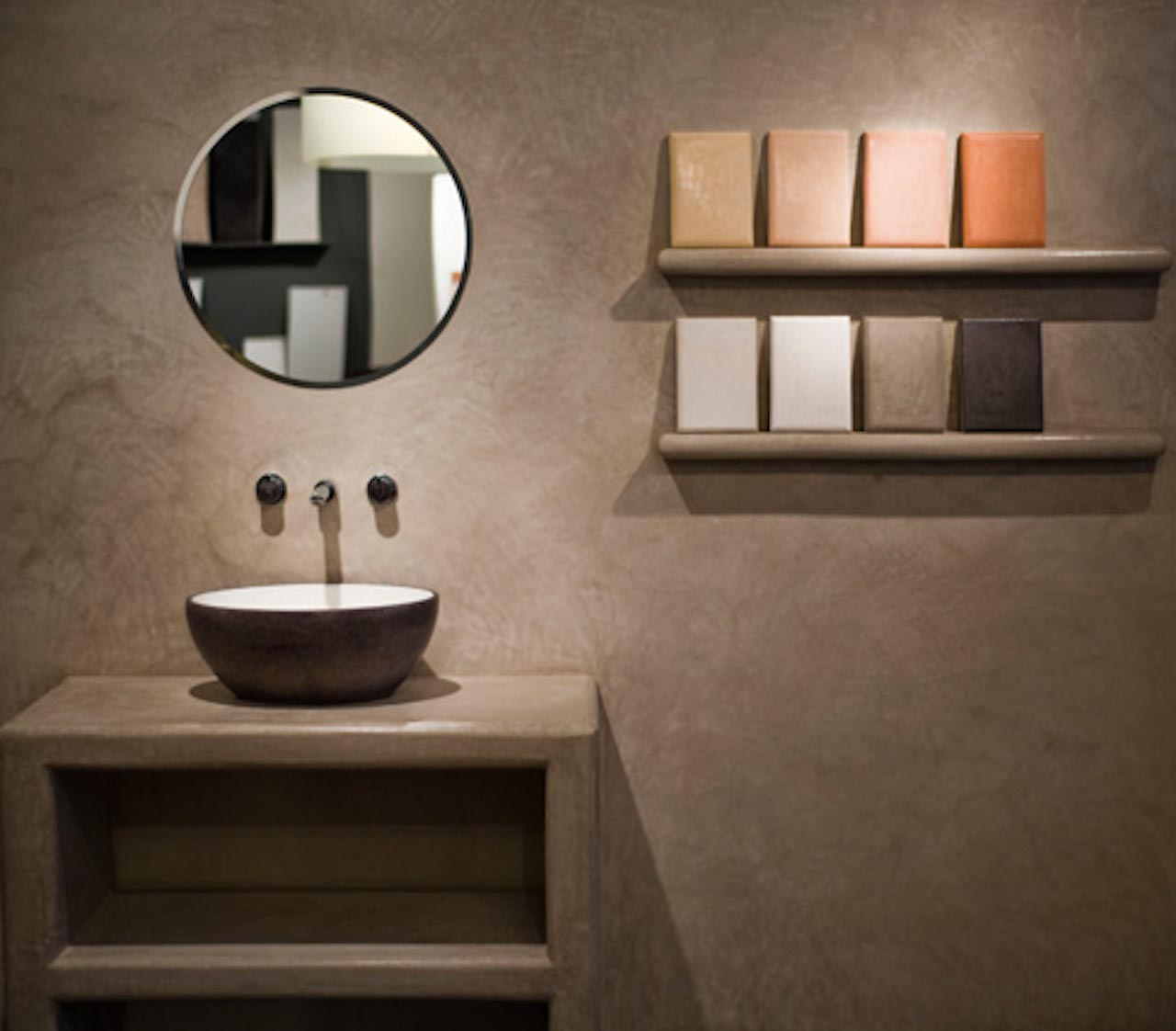 picture of bathroom a round mirror with brown tadelakt wall product