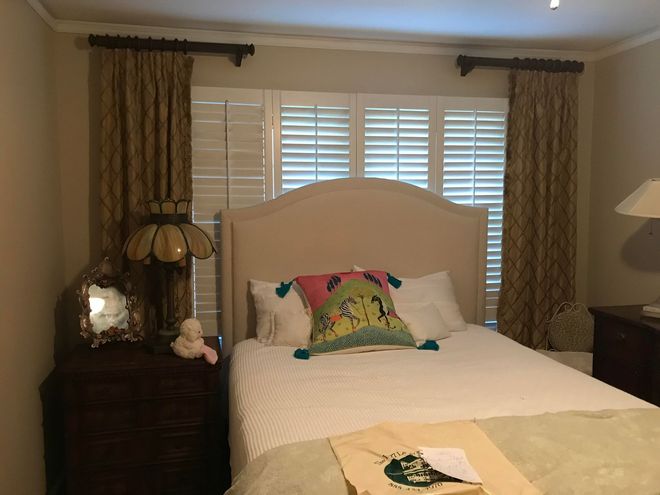 Warm wood horizontal blinds in a cozy study