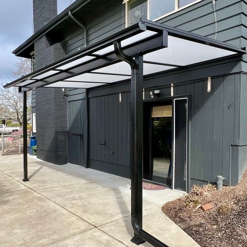 After Crown Patio Covers Installed a Black Shed Style Patio Cover on This House in Bethany, OR