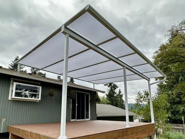 After Crown Patio Covers Installed a White Shed Style Patio Cover on this house in West Linn, Oregon