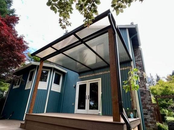 This Patio Cover was Installed in Lake Oswego, OR. Shed-style patio cover replaced old worn-out cover