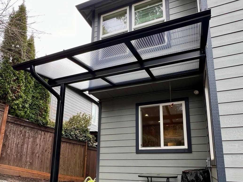 After Crown Patio Covers Installed a Black Shed Style Patio Cover on this house in West Linn, OR