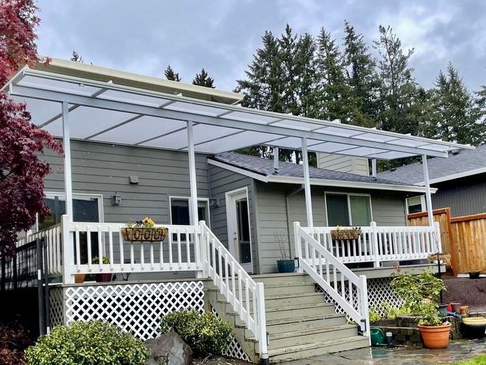 After Crown Patio Covers Installed a White Shed Style Patio Cover on this house in Tualatin, OR