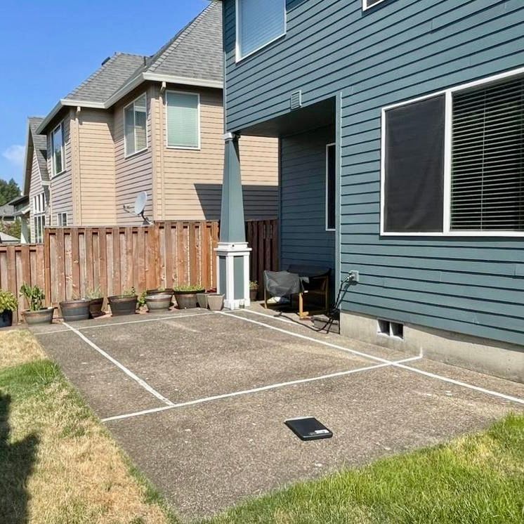 Before Crown Patio Covers Installed a Black Shed Style Patio Cover on This Home in Bethany
