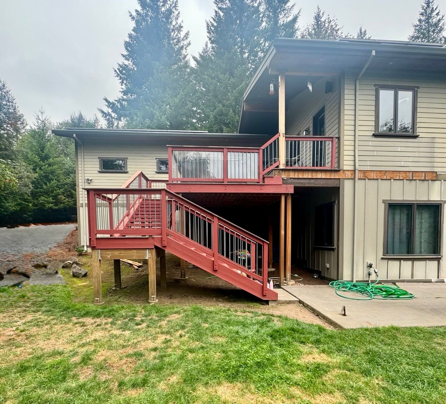 Backyard in Northwest Portland before wall-mounted 26’ x 16’ patio cover with Cool Blue panels was installed
