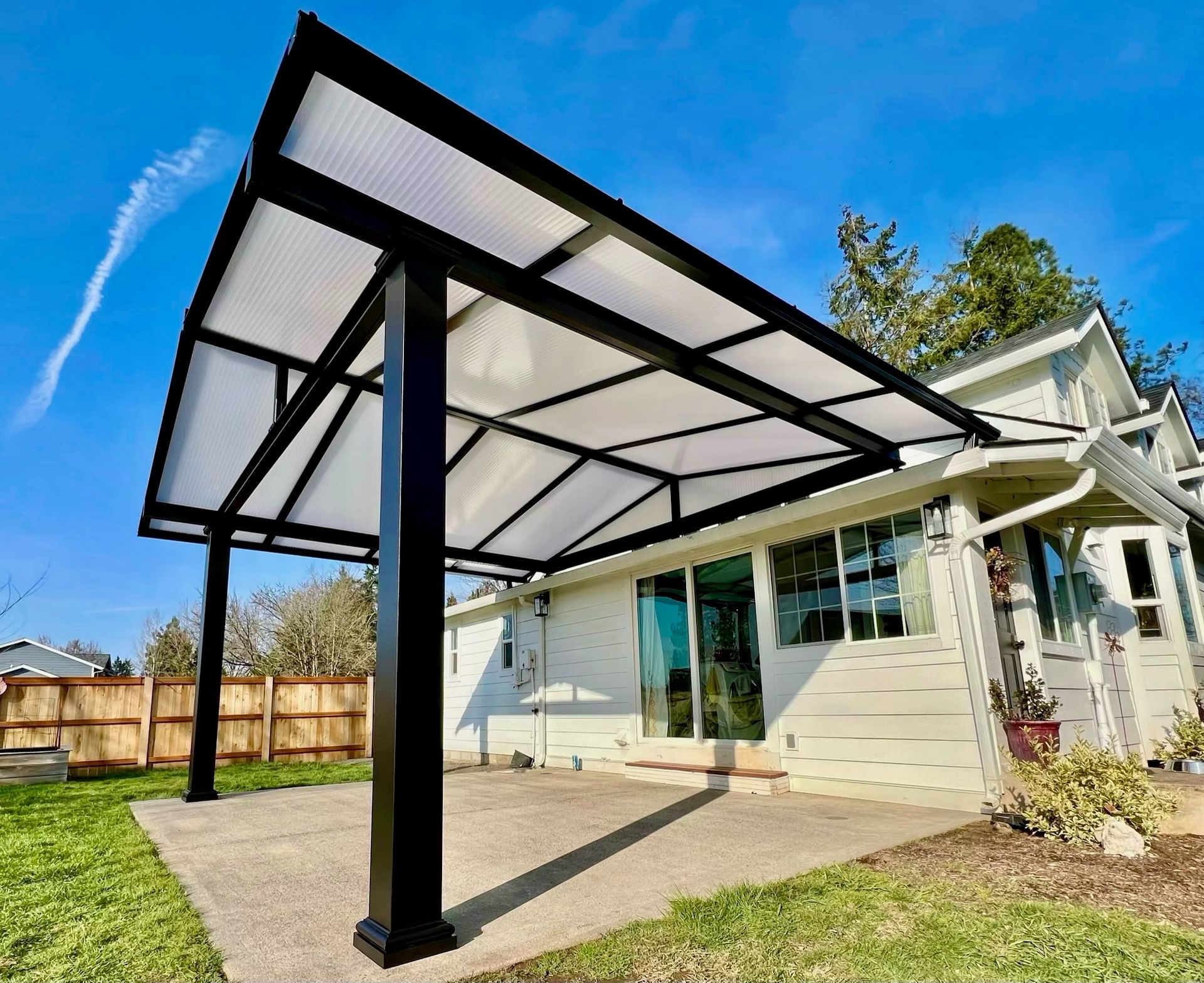 Battle Ground Washington Patio Cover Project - Black Gable Frame with Acrylite Cover built by Crown Patio Covers LLC