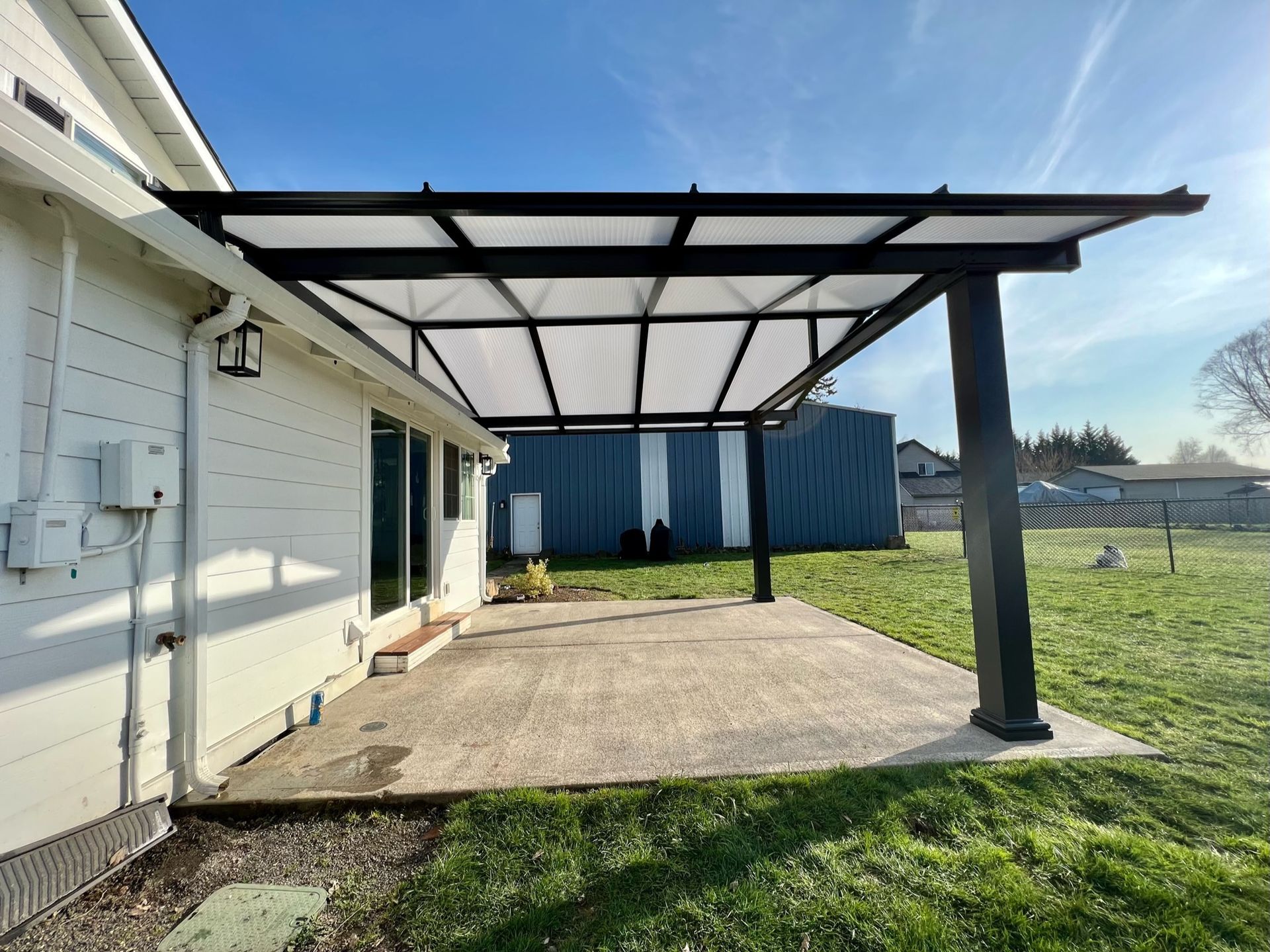 Battle Ground Washington Patio Cover Project - Black Gable Frame with Acrylite Cover built by Crown Patio Covers