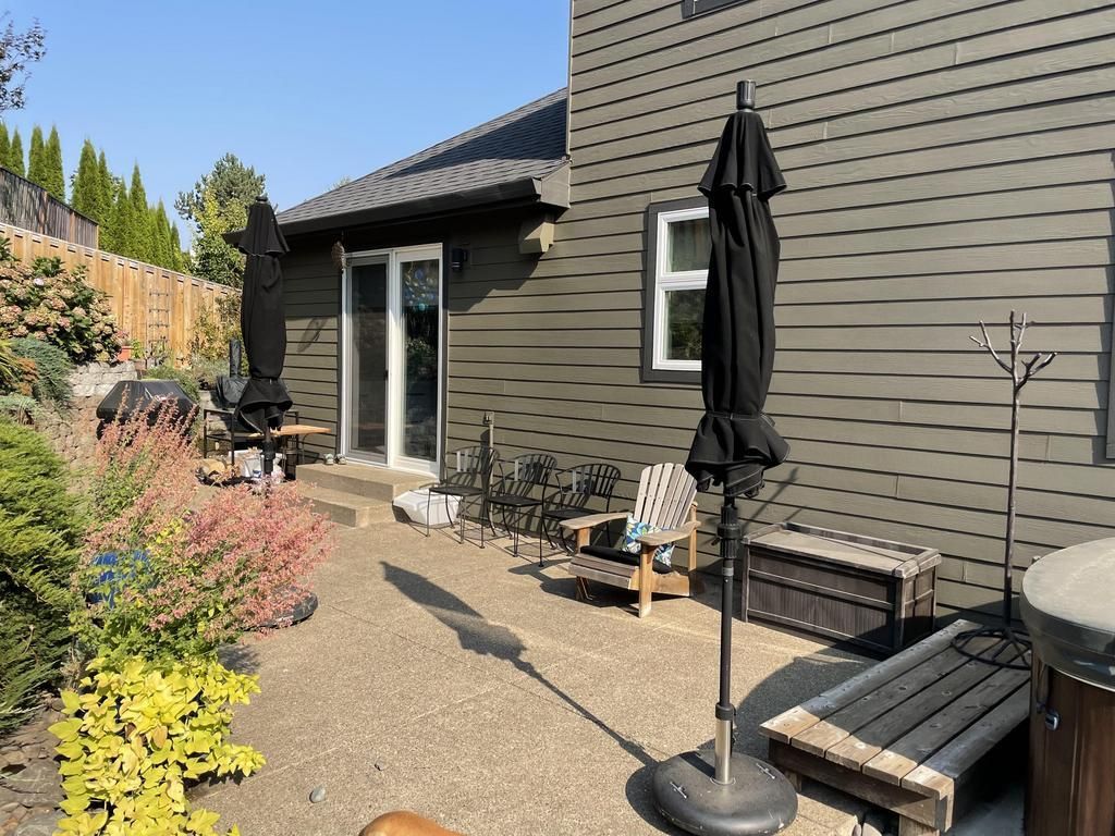 Before Crown Patio Covers Installed a Large 3 shed patio covers merged into 1 - Acrylite acrylic Cool Blue Heat Stop, Black Aluminum Frame  - Tigard Oregon