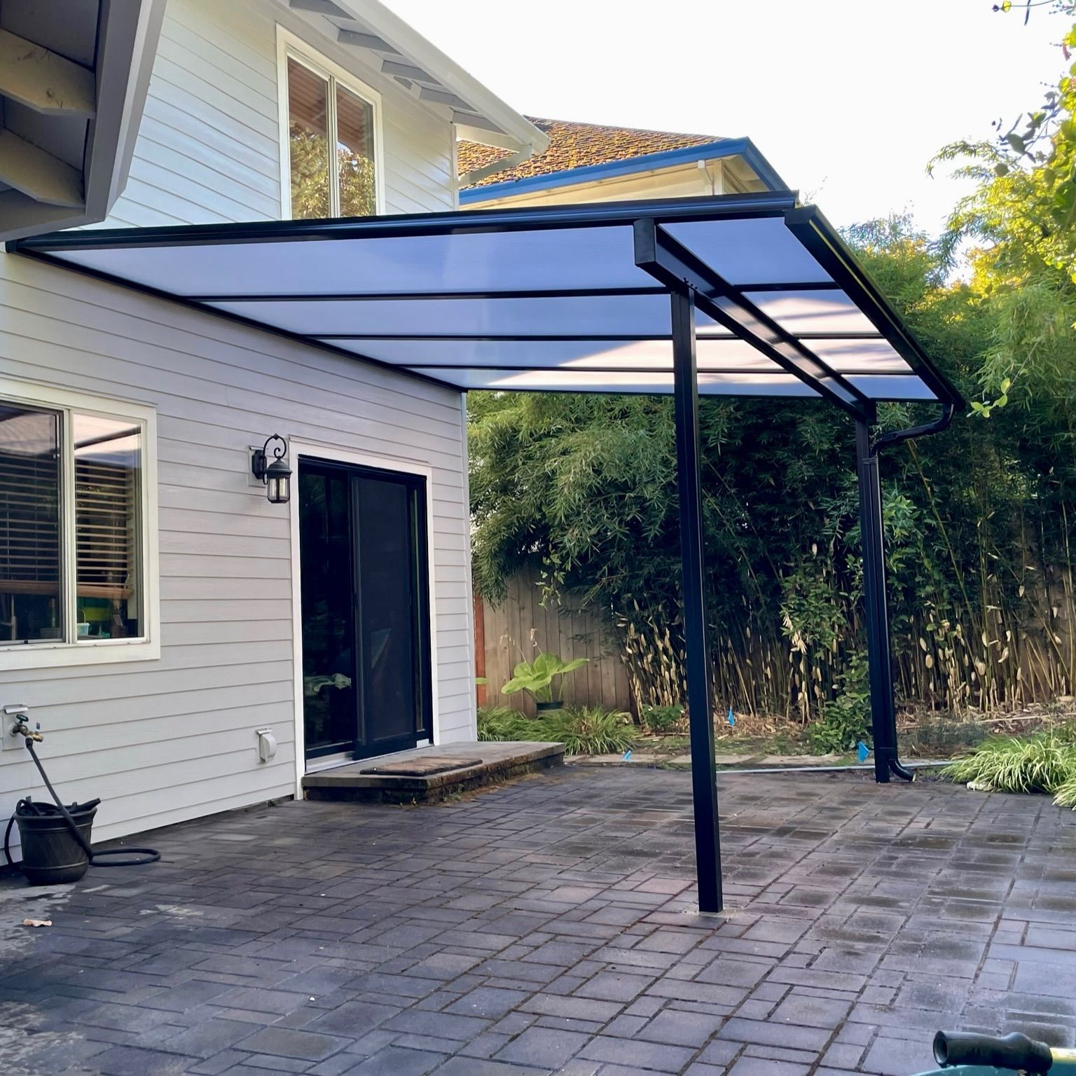 Canby Patio Cover Contractor - Black Shed Frame with Acrylic top - Daylight patio Cover by Crown Patio Covers LLC