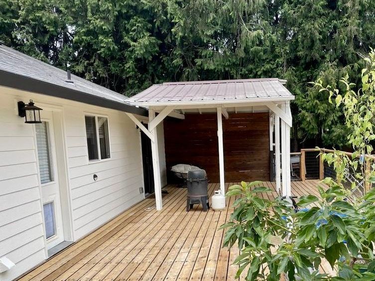 Before Crown Patio Covers LLC  Installed a black shed style Patio Cover with Acrylite acrylic light white panels in Tigard, OR