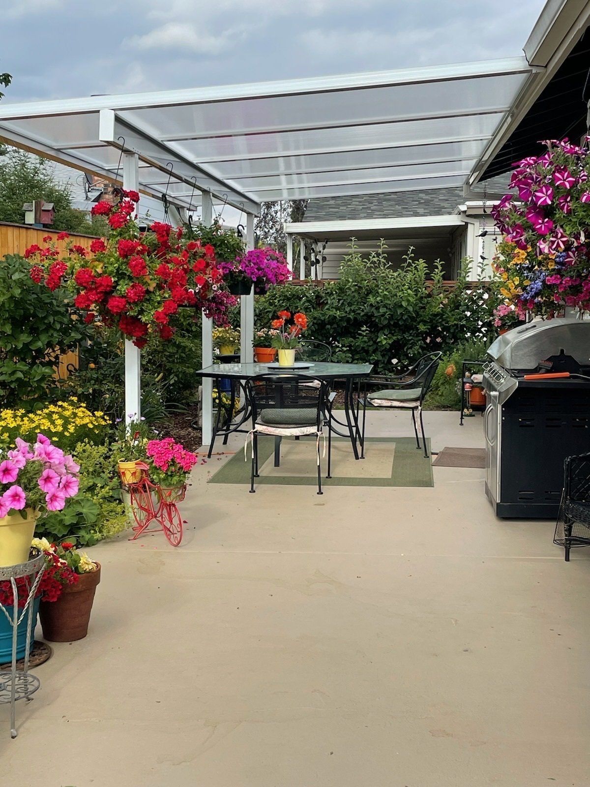 Awesome Patio Cover in Portland with White Frame and Acylite Acrylic Roof - Installed by Crown Patio Covers