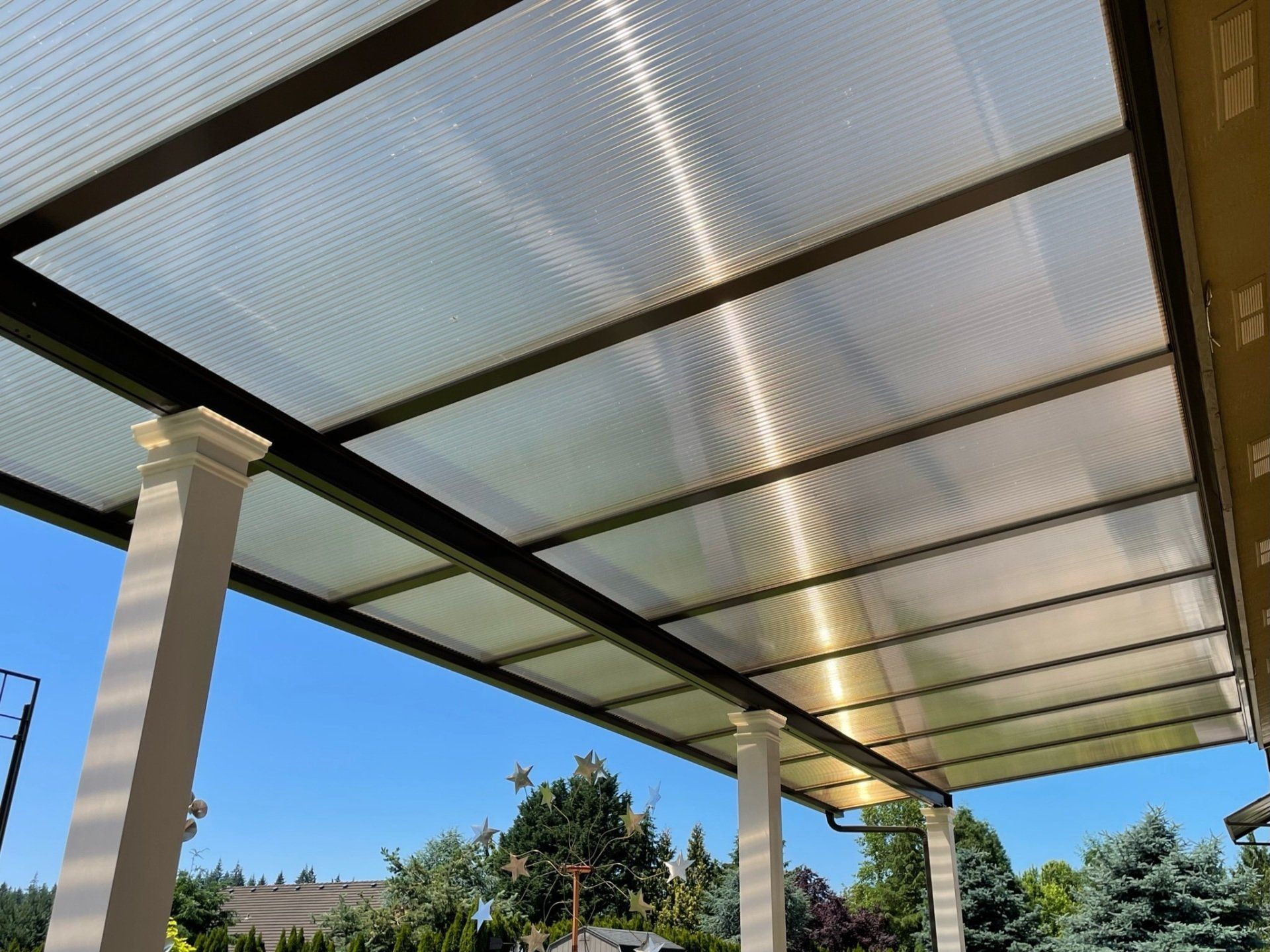 Patio Cover in Portland with Acylite Acrylic Roof Installed by Crown Patio Covers - Local Patio Cover Contractor in Portland Metro Area