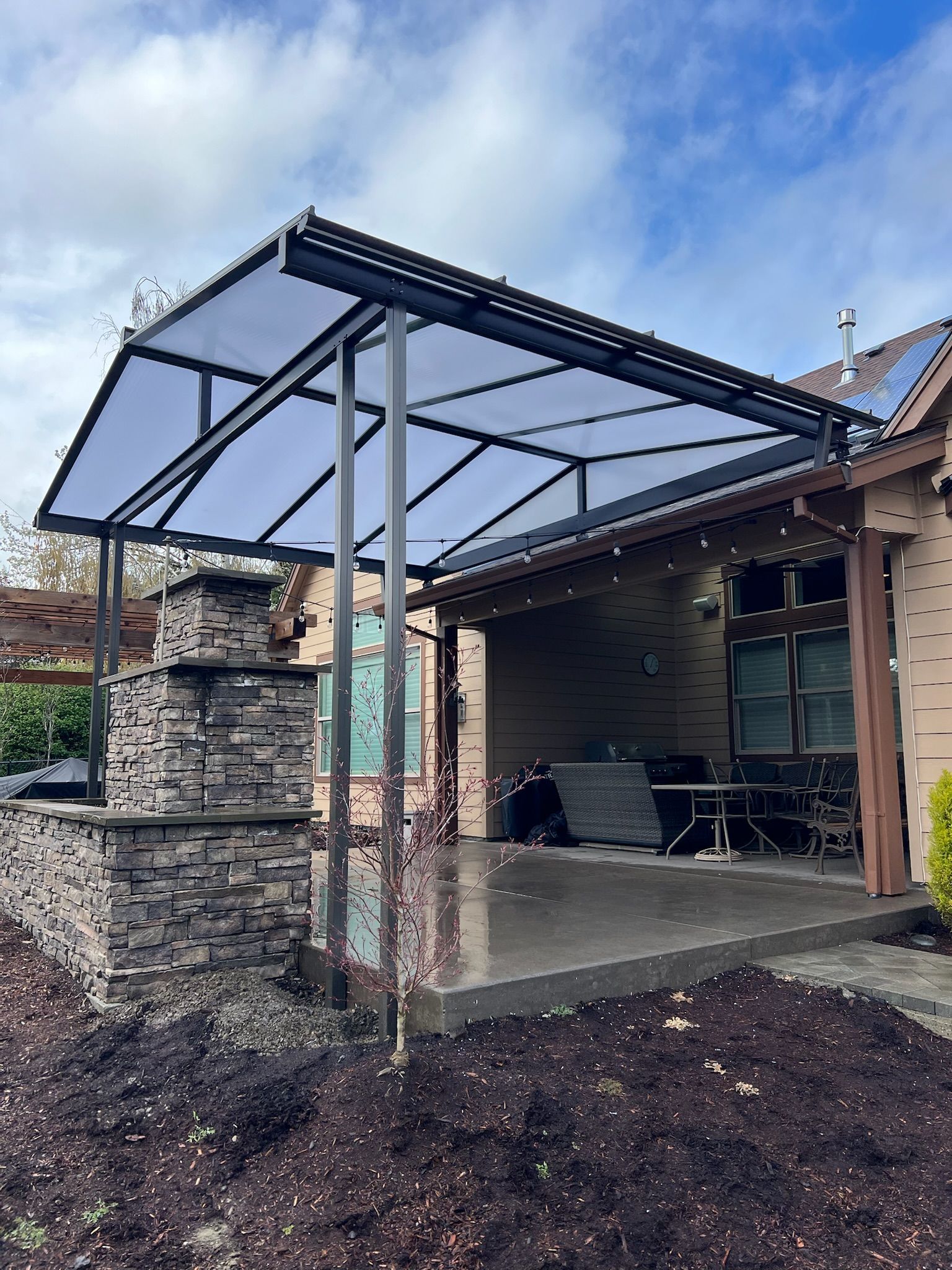 Patio cover installed in Happy Valley Oregon by Crown Patio Covers Front Right Side View - Gable Style Acrylite Acrylic