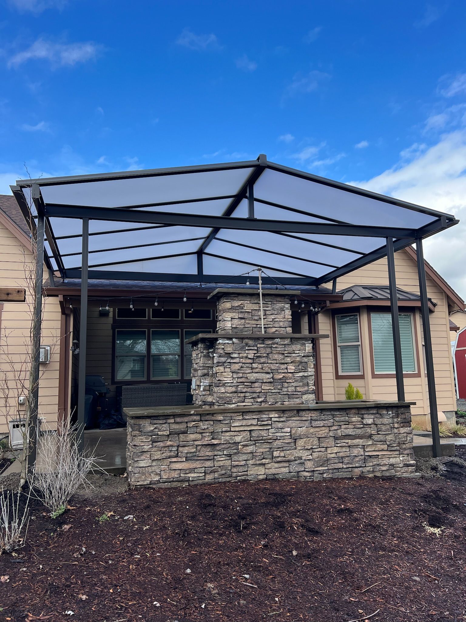 Patio cover installed in Happy Valley Oregon by Crown Patio Covers Front View - Gable Style Acrylite Acrylic