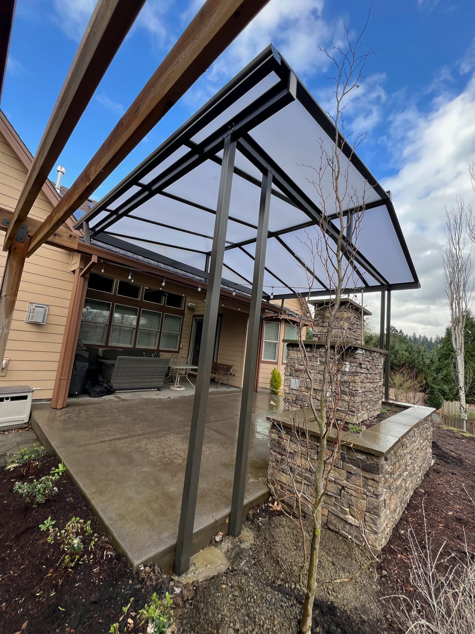 Patio cover installed in Happy Valley Oregon by Crown Patio Covers Left Side View - Gable Style Acrylite Acrylic