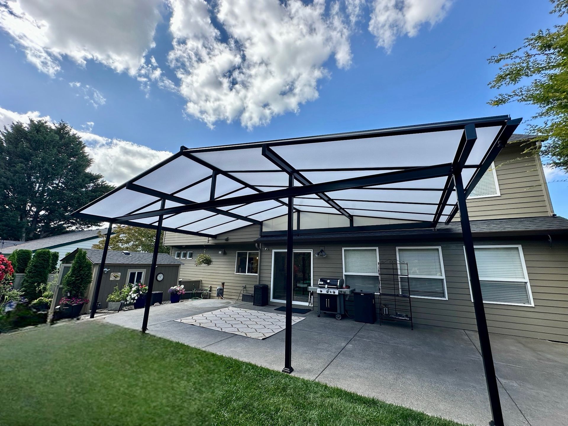 Troutdale Patio Cover Project - Gable Style Black Frame with Acrylite acrylic top by Crown Patio Covers