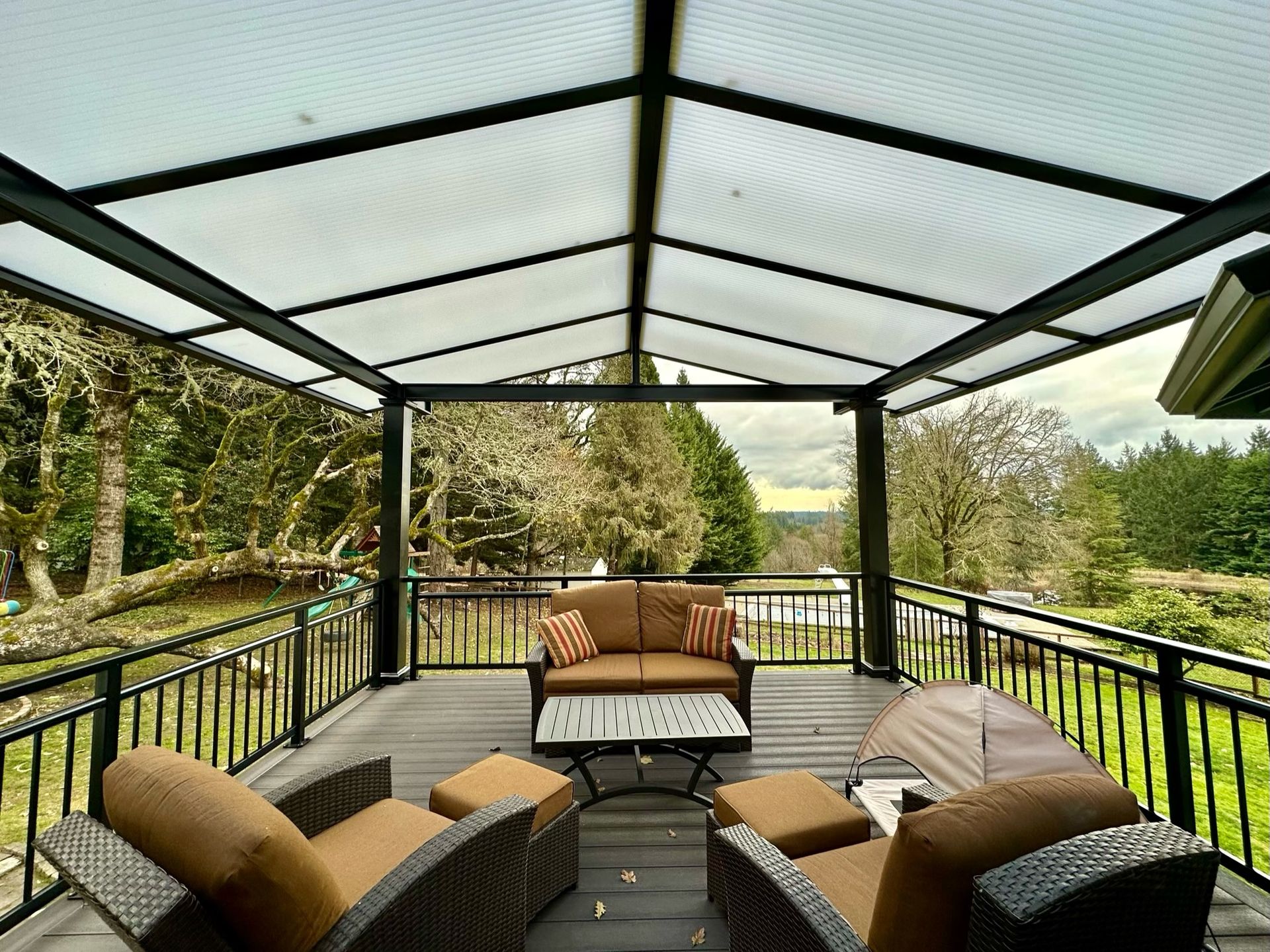 Wilsonville Oregon area Patio Cover Build - Gable Style Black Frame with Acrylite Cover built by Crown Patio Covers LLC