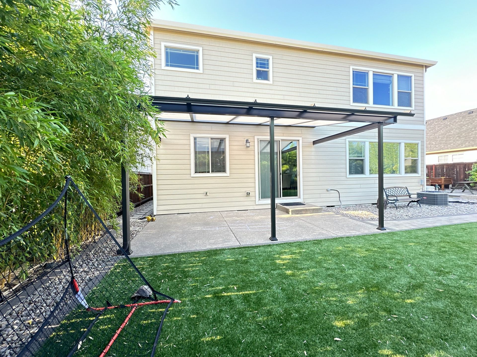 Wilsonville Patio Cover by Crown Patio Covers  - Shed style frame with Acrylite acryllic cover allowing daylight through