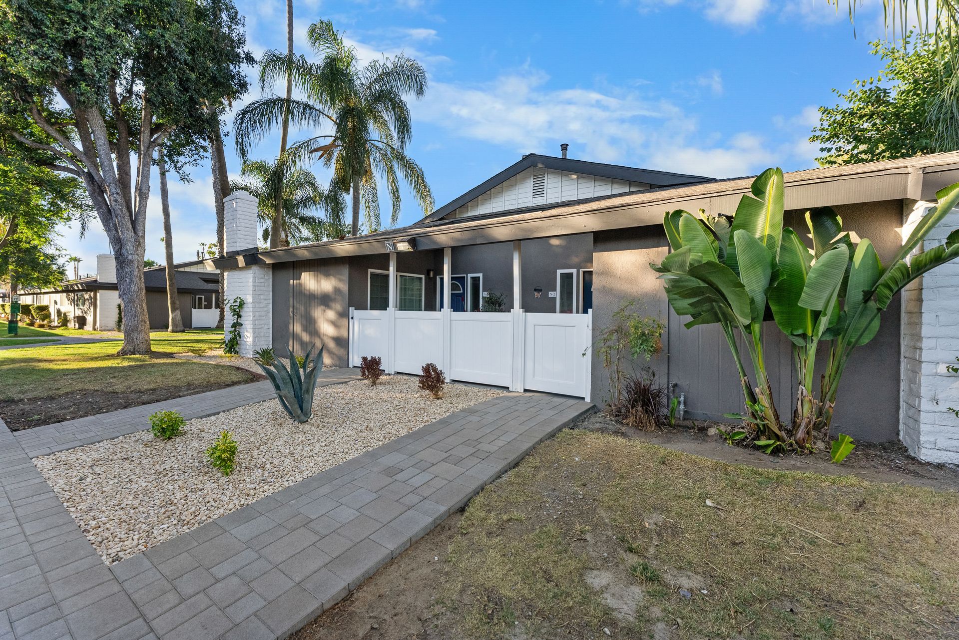 Exterior Photo of Property - walkway to front patio fence