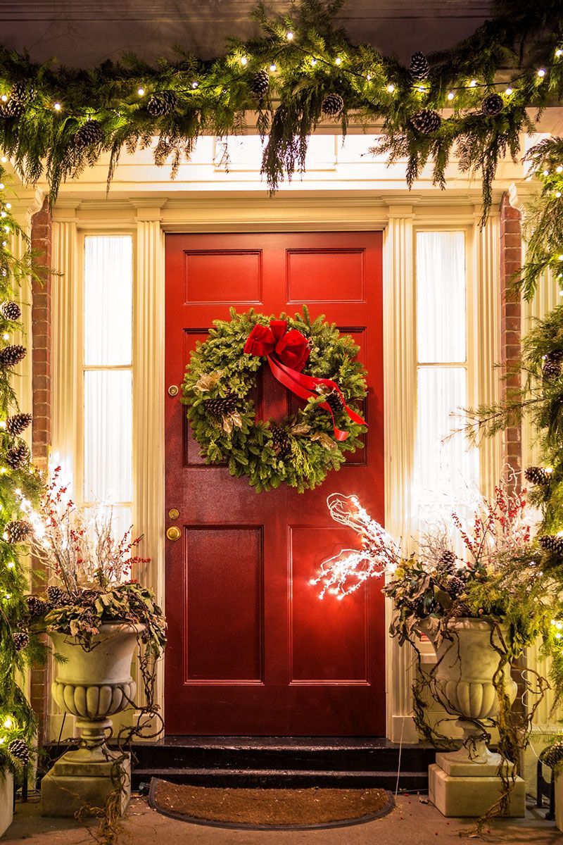 holiday christmas lights with red front door