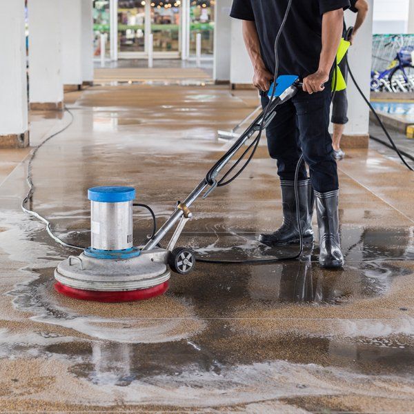 Worker Doing Commercial Floor Washing