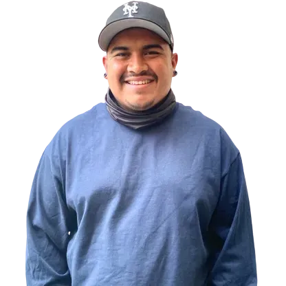 a man wearing a hat with the letter ny on it