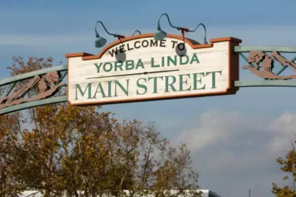 a sign that says welcome to yorba linda main street