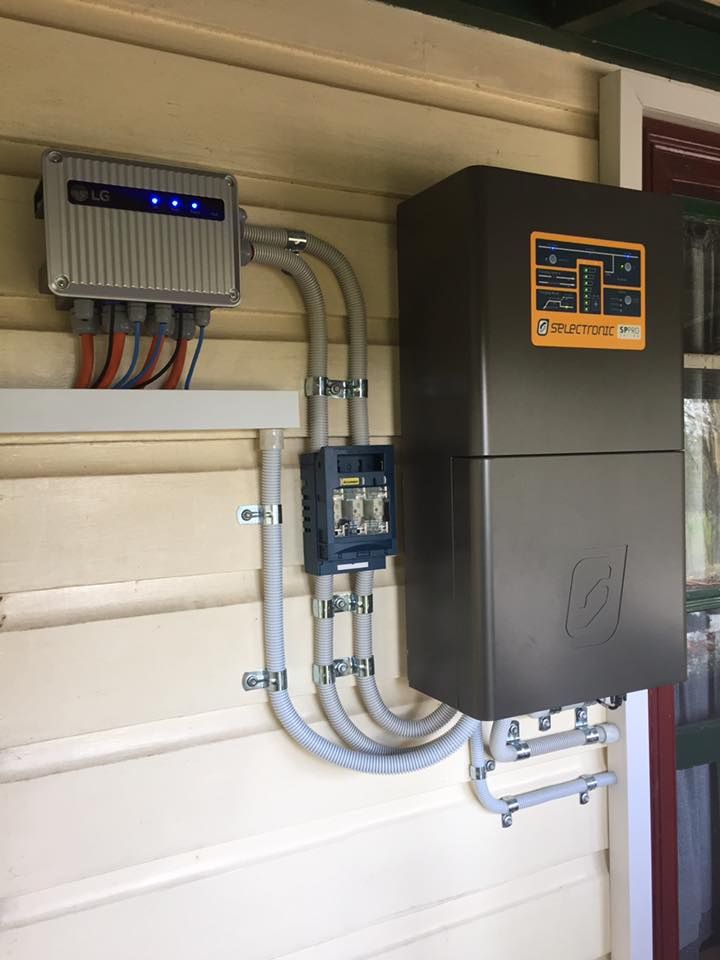 A Black Box Is Mounted On The Side Of A Building — Mackies In Taree, NSW