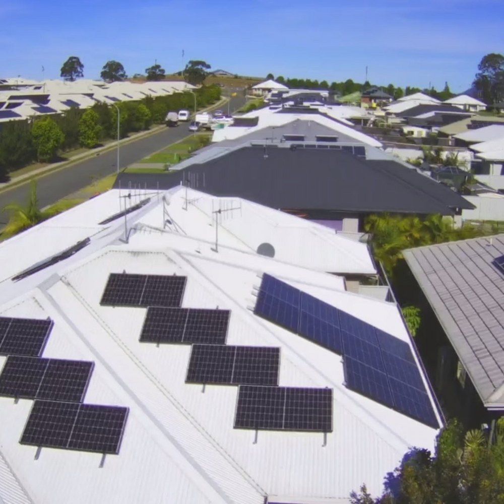 A Row Of Solar Panels On The Roof Of A House  — Mackies In Coffs Harbour, NSW