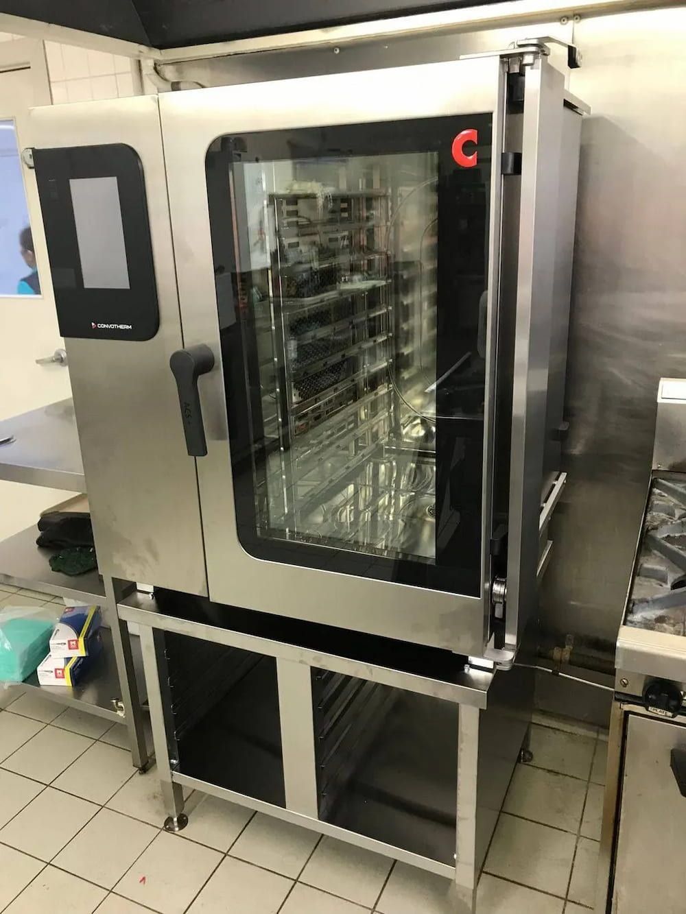 A Stainless Steel Oven Is Sitting On Top Of A Shelf In A Kitchen — Mackies In Taree, NSW