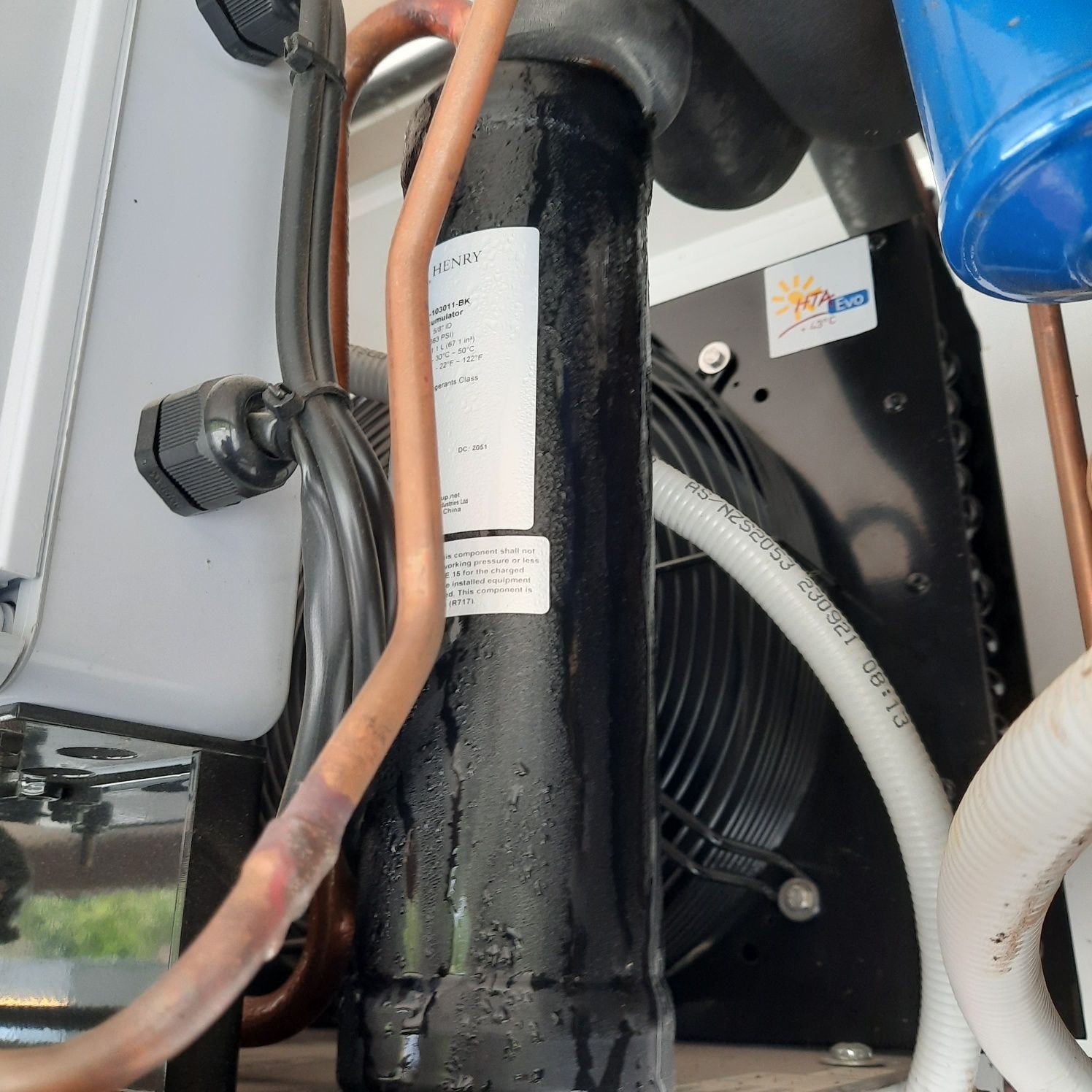Black Cylindrical Compressor With Copper Tubing — Mackies in Taree, NSW