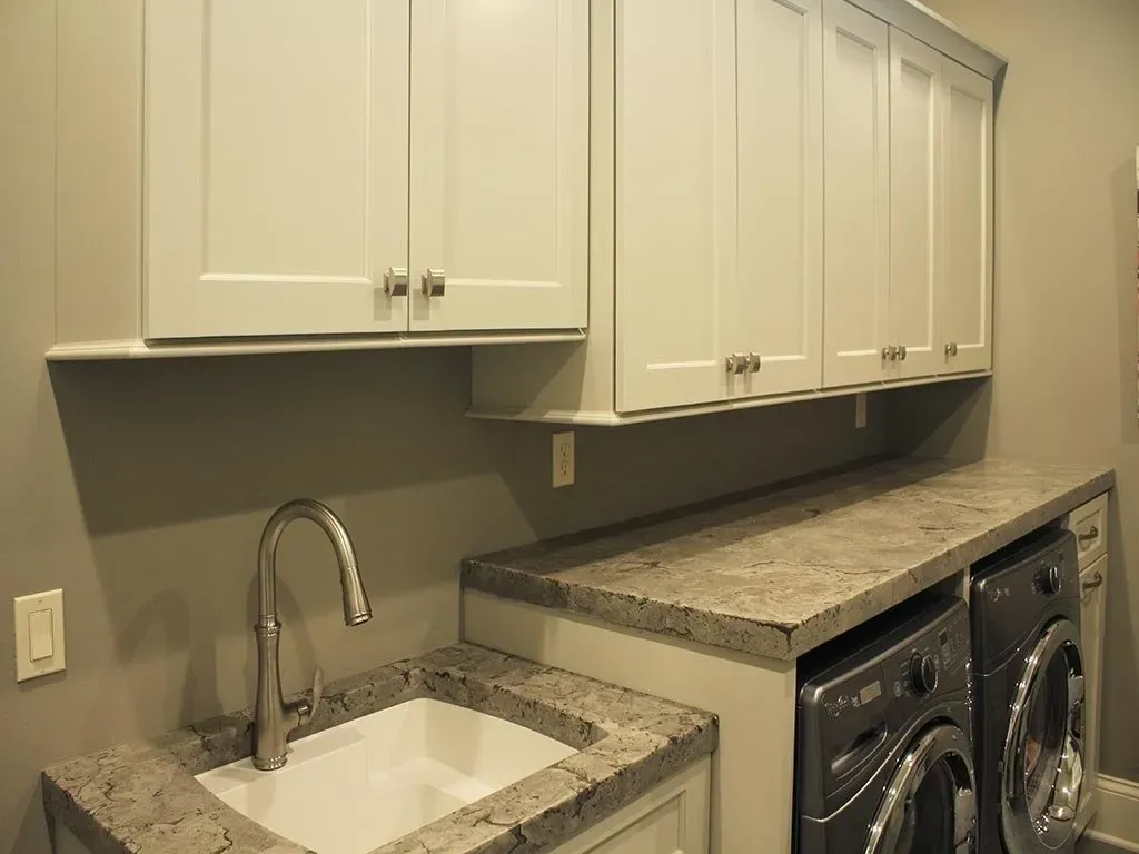 Laundry area with nice faucet | St. Louis, MO | Perspective Cabinetry & Design