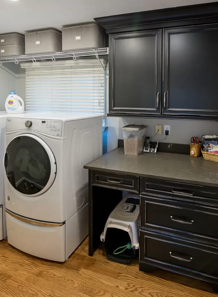 Laundry area with pet cage | St. Louis, MO | Perspective Cabinetry & Design