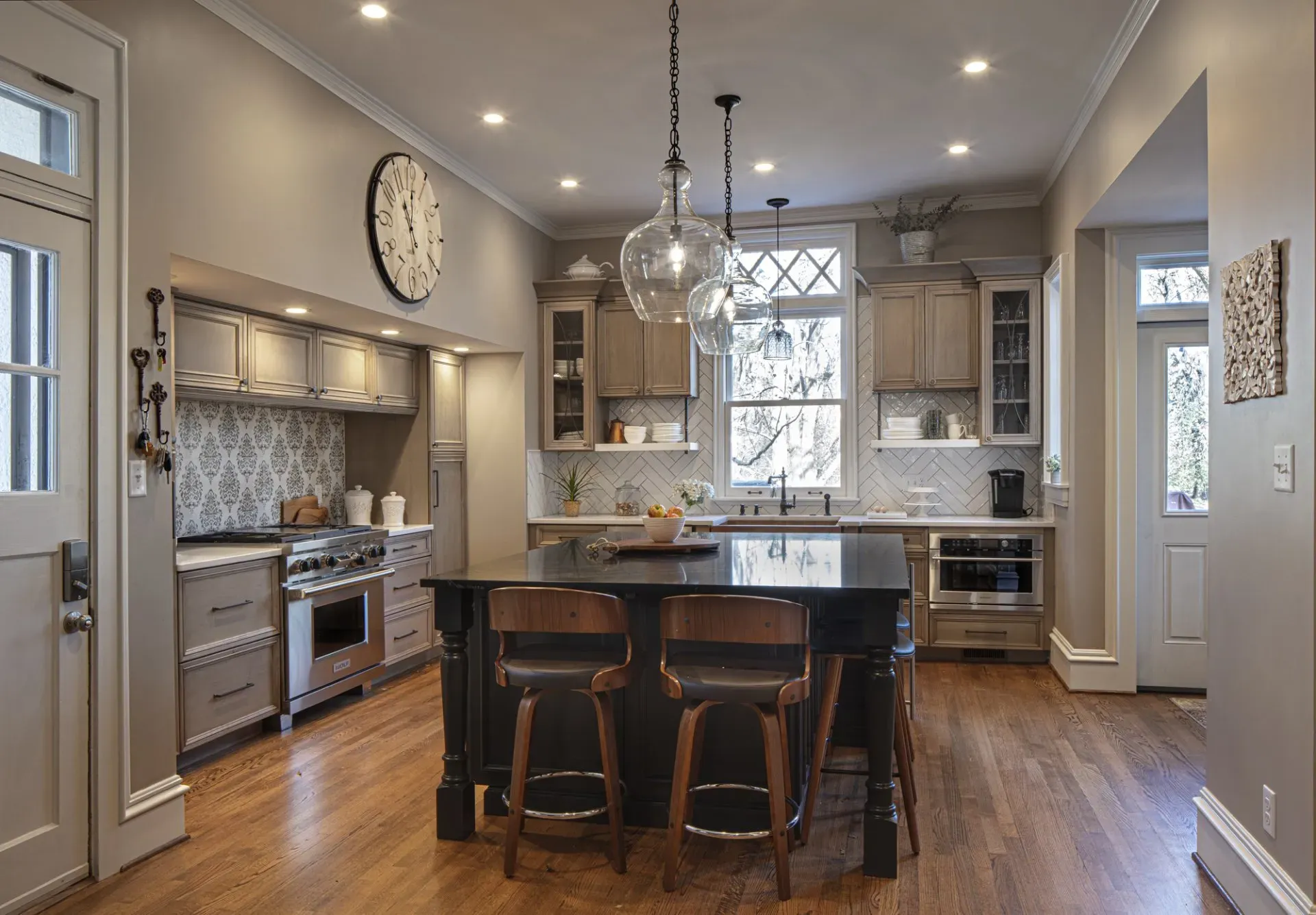 Kitchen with black table | St. Louis, MO | Perspective Cabinetry & Design