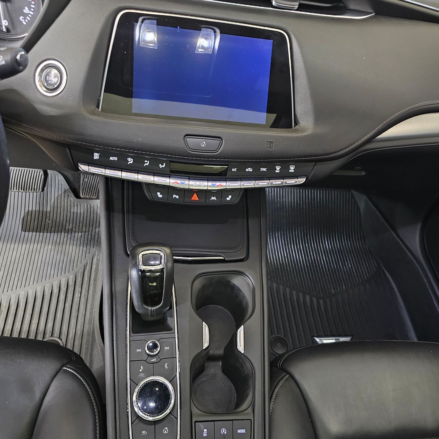 The dashboard of a car with a blue screen