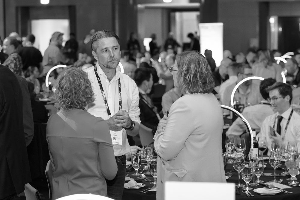 People networking at AISA Event