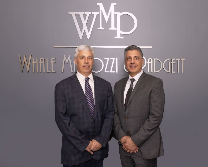 Man Working on Tax Document — New Jersey — Whale Mallozzi & Padgett PC