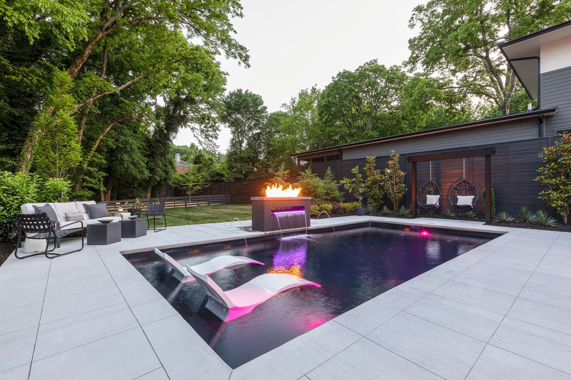 There is a fire pit in the middle of the pool.
