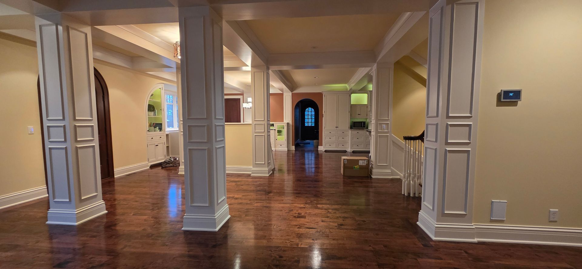 Interior painting completed by Ceiling Solutions, showing freshly painted walls and ceilings.