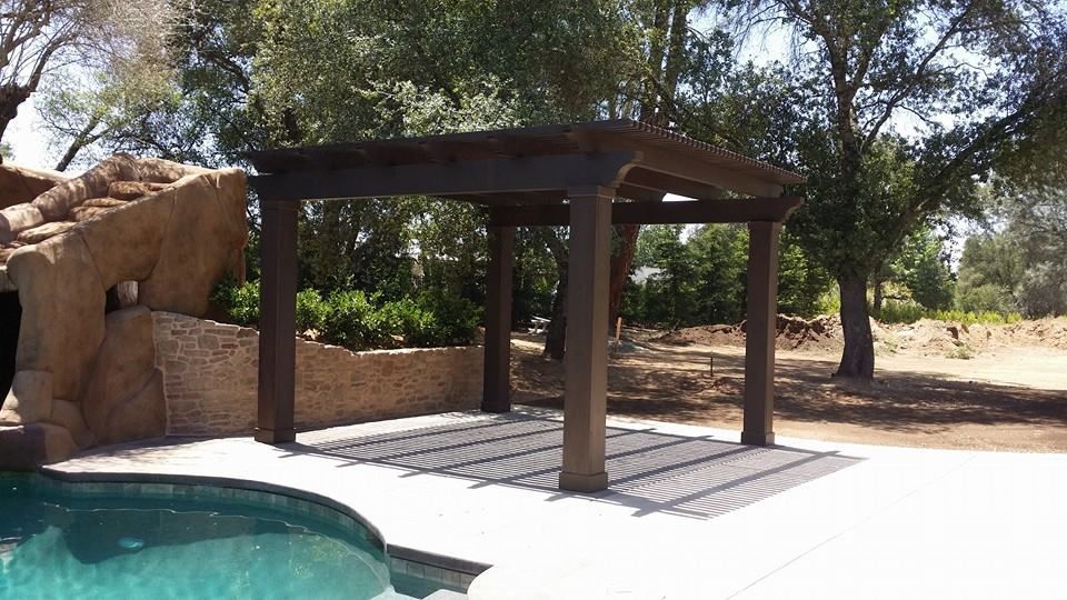 dark brown wood patio cover installation