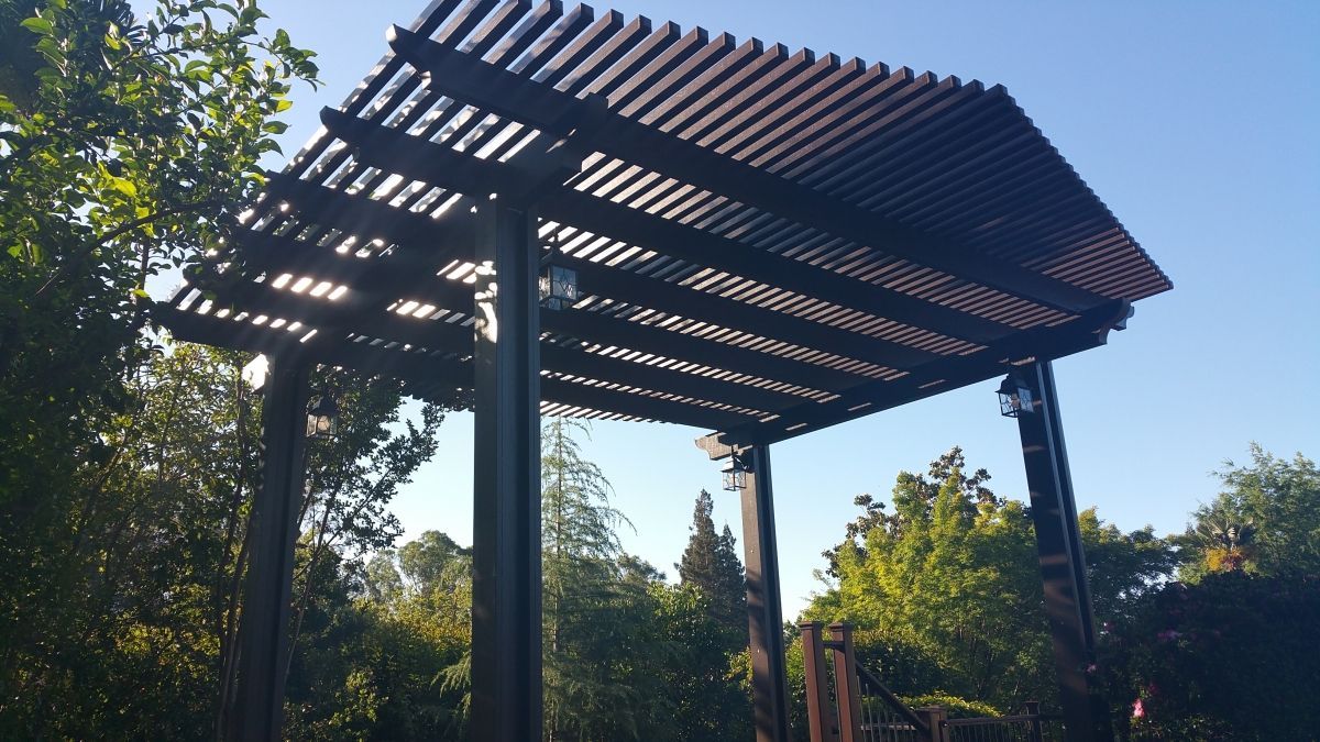 white color patio cover on back area of house