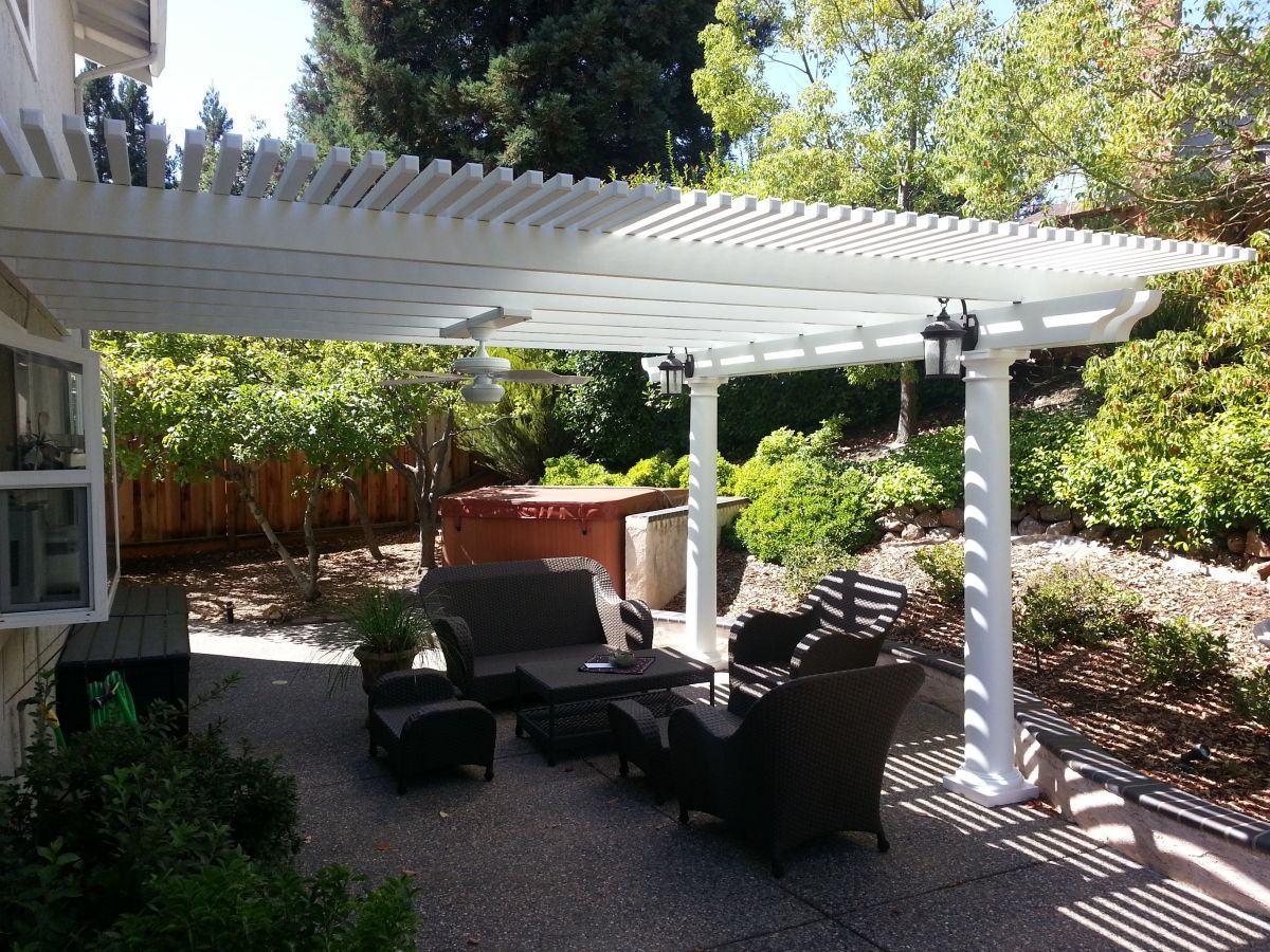 new large white patio cover using white beams